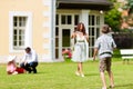 Family is playing in summer in front of their house Royalty Free Stock Photo