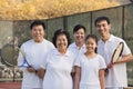 Family playing tennis, portrait Royalty Free Stock Photo