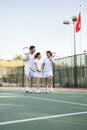 Family playing tennis, portrait Royalty Free Stock Photo