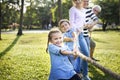 Family playing tug of war Royalty Free Stock Photo