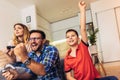 Family playing video games at home Royalty Free Stock Photo