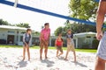 Family Playing Volleyball In Garden At Home Royalty Free Stock Photo