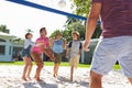 Family Playing Volleyball In Garden At Home Royalty Free Stock Photo