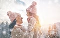 Family playing on winter walk Royalty Free Stock Photo