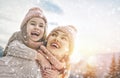 Family playing on winter walk Royalty Free Stock Photo