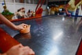 Family plays air hockey