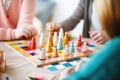 Family playtime: enjoying colorful board game at home