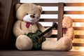 Family of plush teddy bears with a guitar. Royalty Free Stock Photo