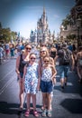 Family portrait Cinderella princess castle Main Street Disney world Florida