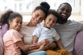 Family portrait of happy african dad, mom and two children Royalty Free Stock Photo