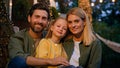 Family portrait happy Caucasian faces male female and kid woman bearded man and little girl father mother and child Royalty Free Stock Photo