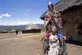 Family portrait of Maasai mother and disabled son Royalty Free Stock Photo