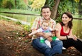 Family portrait - mother father and baby daughter Royalty Free Stock Photo