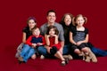 Family Portrait On Red Royalty Free Stock Photo