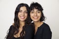 Family portrait of two beautiful sisters on the white background Royalty Free Stock Photo