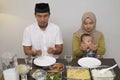 Family pray before having dinner together Royalty Free Stock Photo