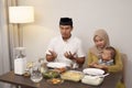 Family pray before having dinner together Royalty Free Stock Photo