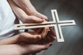 Family prayer with wooden cross Royalty Free Stock Photo