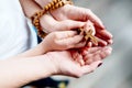 Family prayer with wooden rosary Royalty Free Stock Photo