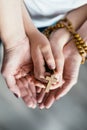 Family prayer with wooden rosary Royalty Free Stock Photo