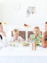 Family praying during their lunch Royalty Free Stock Photo