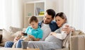 Happy family with smartphone at home Royalty Free Stock Photo