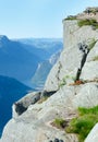 Family on Preikestolen massive cliff top (Norway)