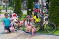 the family prepares for the beginning of the bike ride