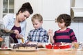 Family Preparing Cupcake