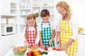 Family preparing fresh salad