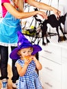 Family preparing halloween food.