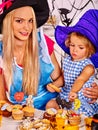 Family preparing halloween food