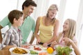 Family Preparing meal,mealtime Together Royalty Free Stock Photo