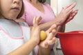 Family preparing sweets in the kitchen Royalty Free Stock Photo