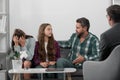 Family at psychology session. Psychologist with young couple, psychotherapist or marriage counselor listen mental health