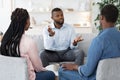 Family Psychotherapy. African American Couple Listening To Counselor`s Advices During Therapy Session Royalty Free Stock Photo
