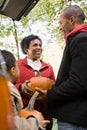 Family with pumpkins Royalty Free Stock Photo