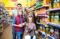 Family purchasing carbonated beverages Royalty Free Stock Photo