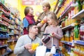 Family purchasing carbonated beverages Royalty Free Stock Photo