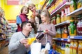 Family purchasing carbonated beverages Royalty Free Stock Photo