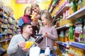 Family purchasing carbonated beverages Royalty Free Stock Photo