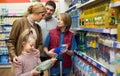 Family purchasing sparkling water in store Royalty Free Stock Photo