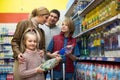 Family purchasing sparkling water in store Royalty Free Stock Photo