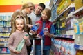 Family purchasing sparkling water in store Royalty Free Stock Photo