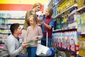 Family purchasing sparkling water in store Royalty Free Stock Photo