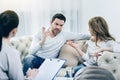 Cheerless emotional man talking to his girlfriend Royalty Free Stock Photo