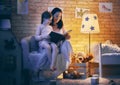 Family reading bedtime. Royalty Free Stock Photo