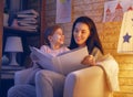 Family reading bedtime. Royalty Free Stock Photo