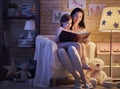 Family reading bedtime. Royalty Free Stock Photo