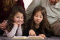 Family Reading the Bible together Royalty Free Stock Photo